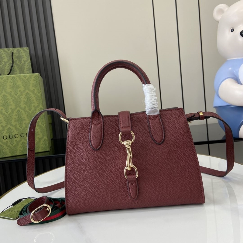 G*u*i top handle bags